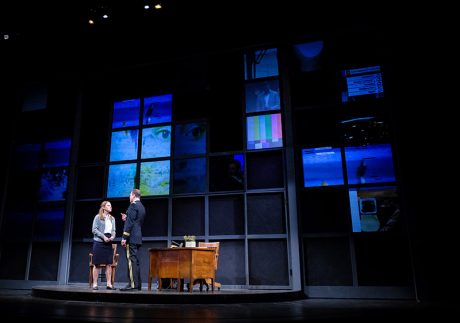 Jessiee Datino and Jason Kolotouros take the stage as abstract projections change the scene in Other Than Honorable. Photos by Huth Photography