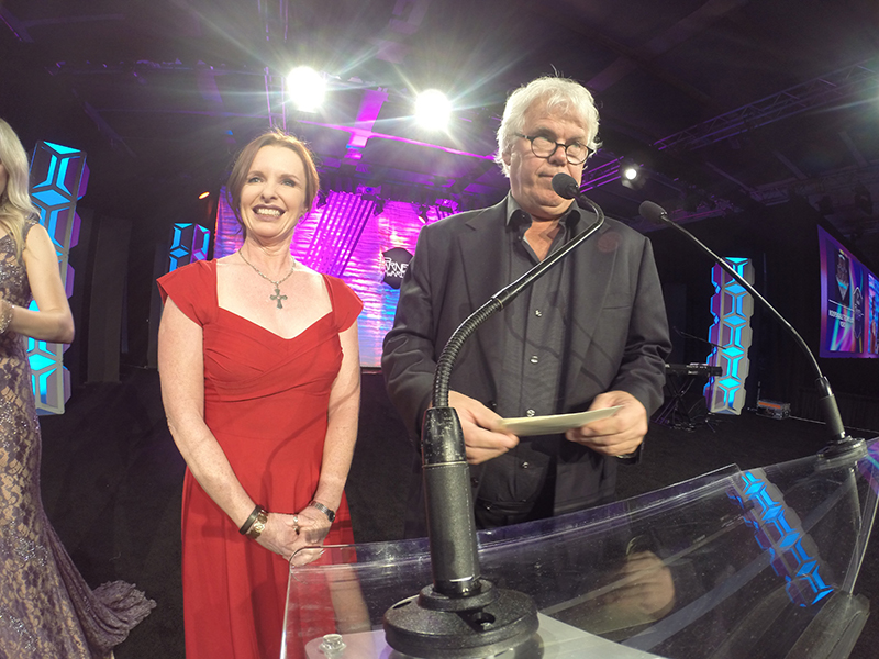 Susan Rose and Danny O’Bryen presenting an award at the 2018 Parnelli Awards.