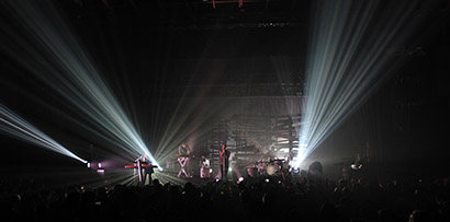 Cory FitzGerald’s design for Owl City’s Fall 2012 tour included beams of light blasting through barnwood slats. Photo by Cory FitzGerald.