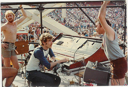 Eric Pearce with an early lighting console, the Alderham 604.