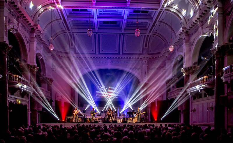 The Ultimate Eagles toured the U.K. with Elation Platinum Beams and Spots. Photo by Marty Moffatt shows the band performing at Cheltenham Town Hall, September 21, 2014
