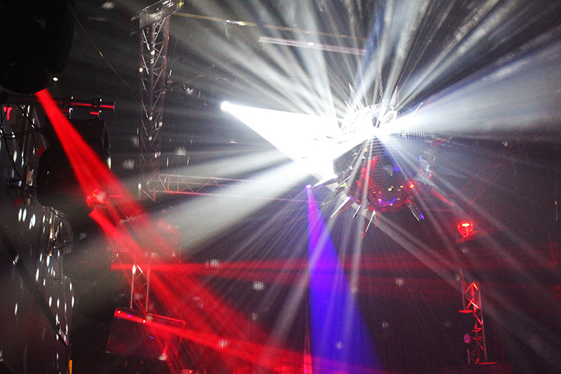 FORT LAUDERDALE, FL — For Hunter’s nightclub, Jay Krause of Sound and Lighting Solutions provided the owners with a demo of Rogue R1 Spot and R1 Beam fixtures from Chauvet Professional. The club has since installed six Rogue R1 Spots and four Rogue R1 Beams. More details from Chauvet Professional (www.chauvetprofessional.com): “As soon as our client saw demos of the Rogue R1 Spot and R1 Beam, they fell in love with the fixtures,” said Krause. “They wanted them yesterday. They were super excited, because they saw what the Rogues can do in a bi-level club — which is create added depth plus all of these magical uplifting images in the air.” There are 6 Rogue R1 Spots and 4 Rogue R1 Beams in Krause’s rig at the club. He positioned the beams midway between the first and second levels. “They sort of hang out over the dance floor, which allows them to reach most everywhere in the club,” said Krause. The beams also create a multi-dimensional image over the dance floor, thanks to the layering that can be achieved with their split prism feature. “I love the two prisms on the Rogue 1 Beams,” said Krause. “They are just unreal! When you stack them, they look ridiculous and I mean that of course in a very, very positive way. I’ve not seen another light that can do this — plus crowds love the way they look.” For rich mid-air and mid dance floor imagery, Krause relies on the Rogue R1 Spot fixture. Like the Rogue R1 Beams, the spot fixtures are positioned between the two levels and aimed at a giant mirror ball. The intense output and beam shaping capabilities of this fixture allow it to create some mind tingling images that fill the entire area over the dance floor when they hit the massive mirror ball. “It’s really a very impactful image that adds to your sense of excitement no matter where you are in the room,” said Krause. “We run everything with a Martin Light Jockey controller, because it helps us accentuate the speed of our fixtures, which tends to sweep people up.” In addition to being a dance club, Hunter’s draws crowds with a series of specials like country and western dancing, karaoke, a cabaret and a range of different events. “The color rendering capabilities of the Rogue fixtures and their wide range of gobo options make them well suited for the club’s varied menu of activities. “We’ve created just about every color imaginable with the Rogues,” said Krause. “The club changes so often with different themes. The Rogues help it keep up by creating different looks. Our client thinks the Rogues are fantastic.” Krause apparently shares this view of the Rouge Series. “We selected the Rogues for their reliability and value,” he said. “They’ve more than met our expectations. They‘ve been working without a hitch from the beginning and are worth every penny. Not many fixtures can compare with its features at this price.”