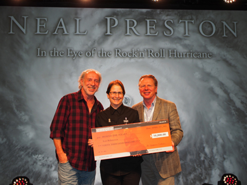 (L to R): Photographer Neal Preston, Lori Rubinstein from Behind the Scenes, and Ralph-Jörg Wezorke owner of Lightpower.