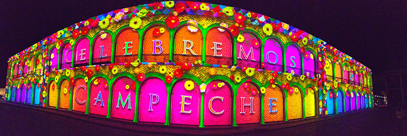 “Celebremos Campeche” is a 30-minute video displayed on the two-story, curved arcade of the Biblioteca in the historical district of Campeche, a UNESCO World Heritage site.