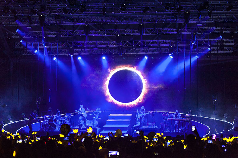 Taeyang performing with Robe BMFL Spot moving lights supplied by Showtec