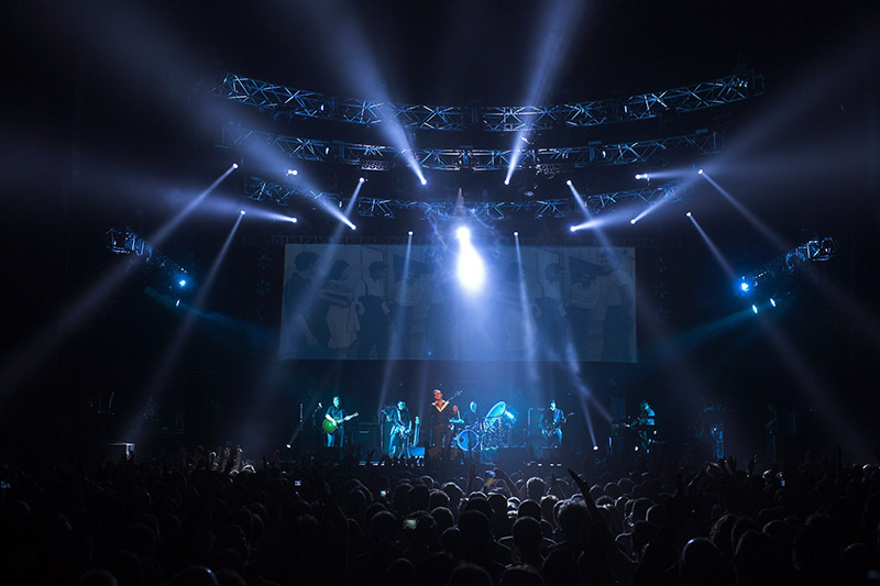 The video element of the live show has been building for the last three years and is currently based around a large upstage projection screen showing a variety of footage through the set. (c) Louise Stickland