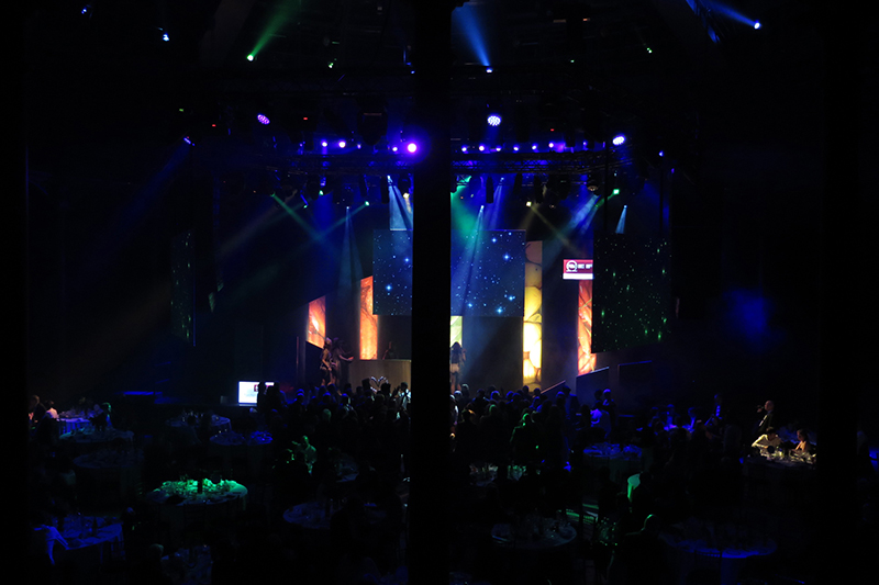 Six Nexus Aw 7x7 panels uplight the custom-covered set panels as part of the main awards set