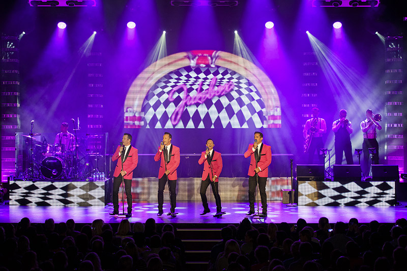 Risers support the main curtain as well with a combined total of 32 feet spanning the stage at a height of two feet.