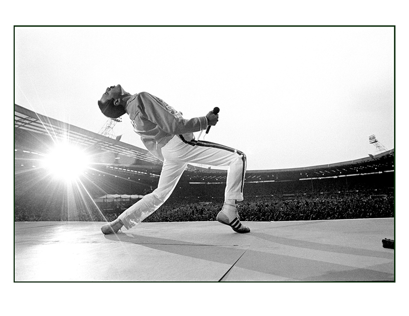 Freddy Mercury from Queen performing at Wembley Stadium, London. Photo by Neal Preston