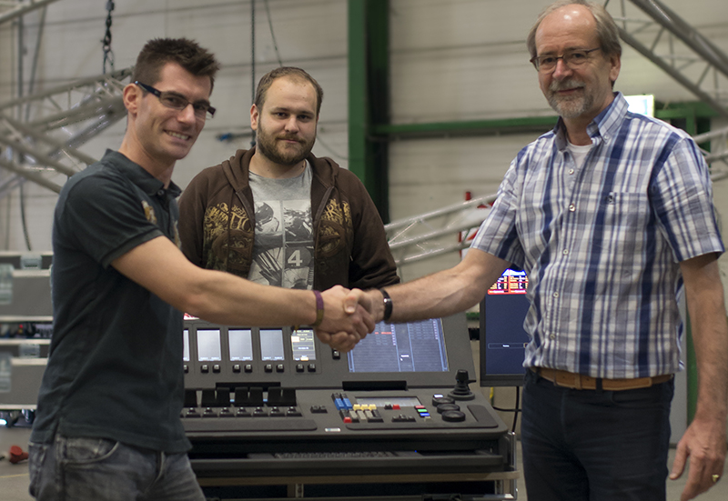 Belgium-based lighting, video and motion control design house Gravity added XLNT CyberMotion's CyberHoist II system to its offerings. Pictured here, from left, are Gravity's Rik Uyttersprot and Robin van Bael; and XLNT's Hans van der Moolen.