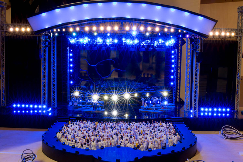 The miniaturized stage show includes tiny Clay Paky fixtures.