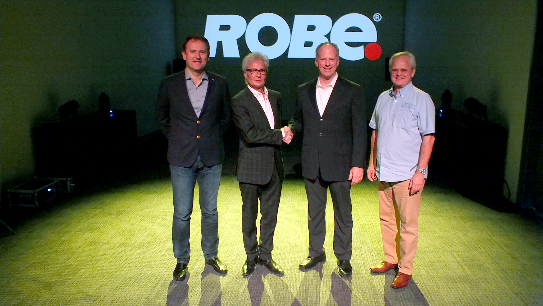 Pictured here, from left, are Josef Valchar, Robe s.r.o. CEO & Founder; John Bilyk; Bob Schacherl, CEO, Robe North America; and Harry von den Stemmen, Robe s.r.o. Sales Director.