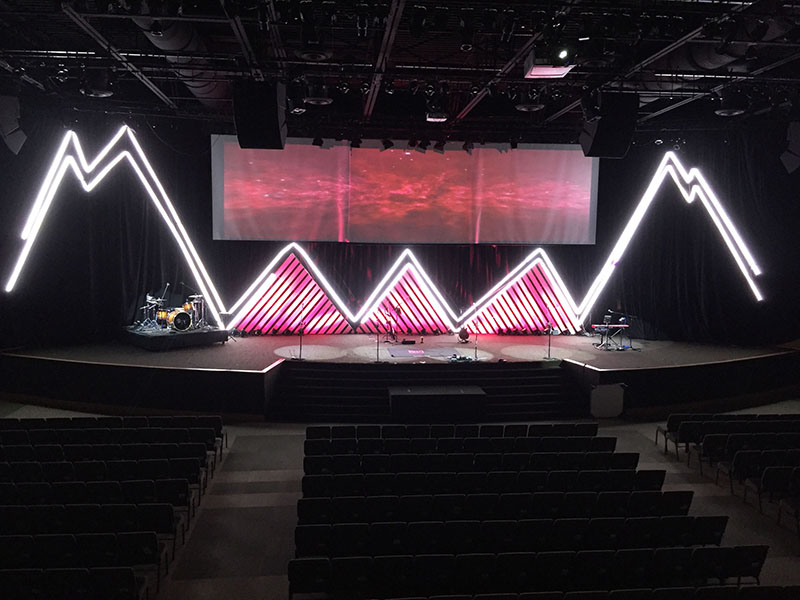 At the church’s Christian Life Center, a 15,000-square-foot sanctuary holding up to 1,200 worshipers, the upgrade includes new video and lighting systems featuring a mountain, tying in with a sermon’s theme.