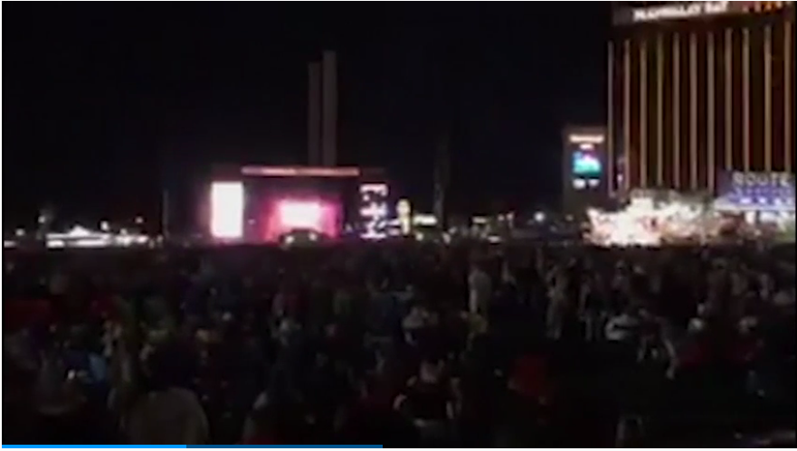 Amateur video still shows the crowd outside the Mandalay Bay, moments before shots rang out.