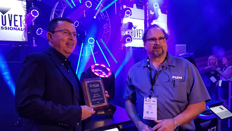 Albert Chauvet accepts his Gold Star Award for Best New Effects Light. He's pictured here at left with PLSN editor Nook Schoenfeld.