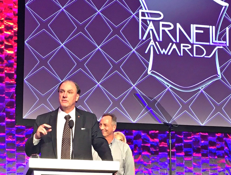 Strickland Accepts Award